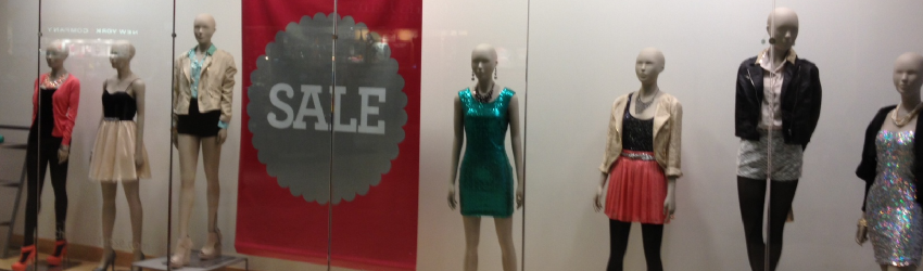 female mannequins in store window