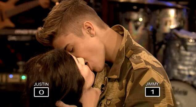 Justin Beiber kissing a mannequin head