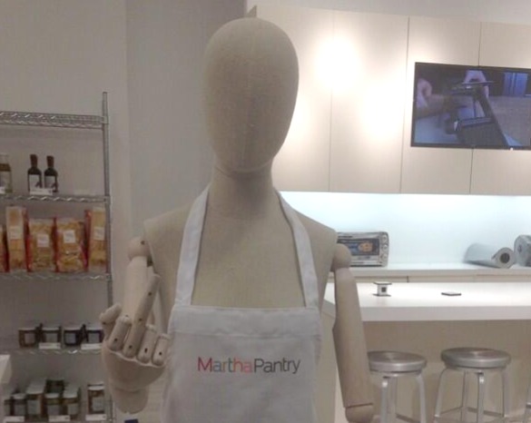 mannequin giving middle finger to customers
